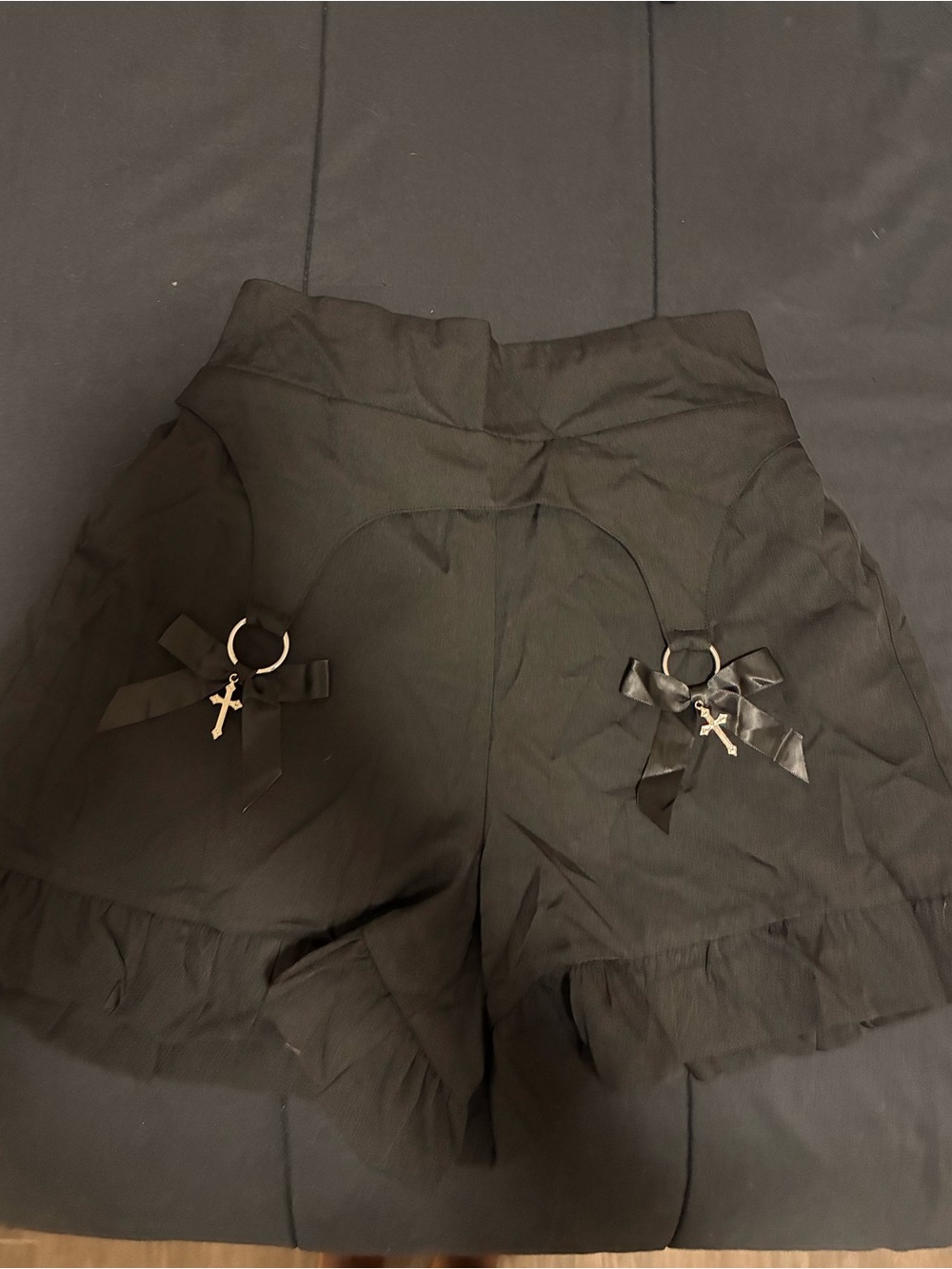 Black Ruffle Hem Skorts with Bow & Cross Ring Details